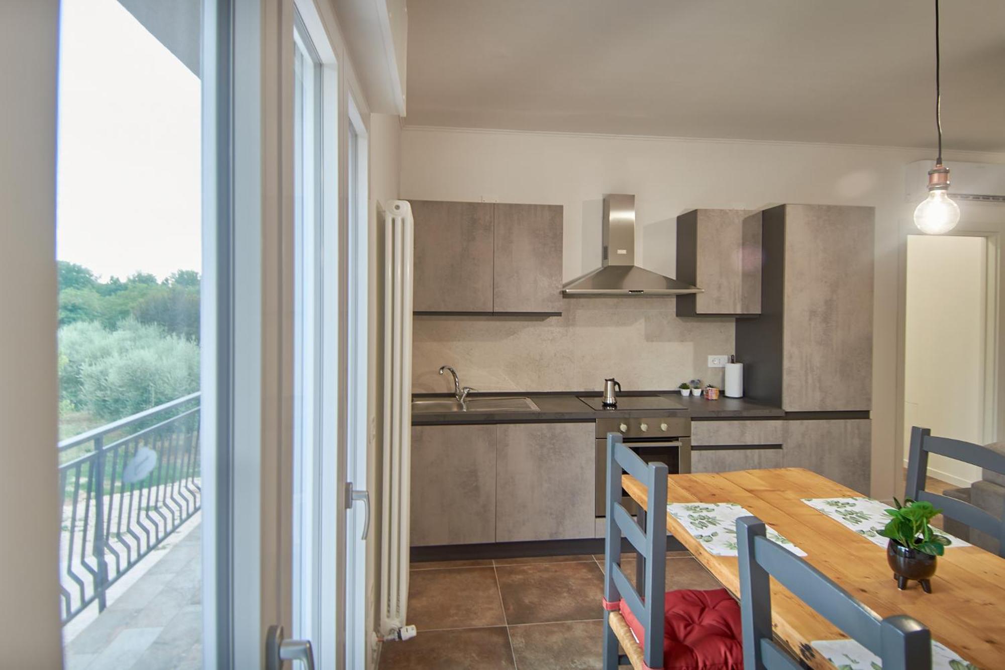 Mira Assisi Apartment Bastia Umbra Bagian luar foto